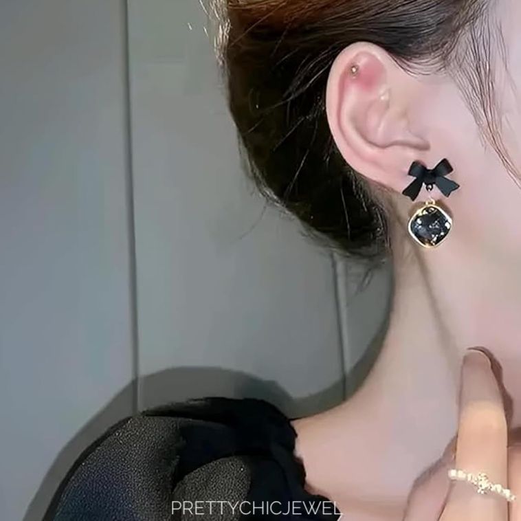 Black bow rhinestone earrings